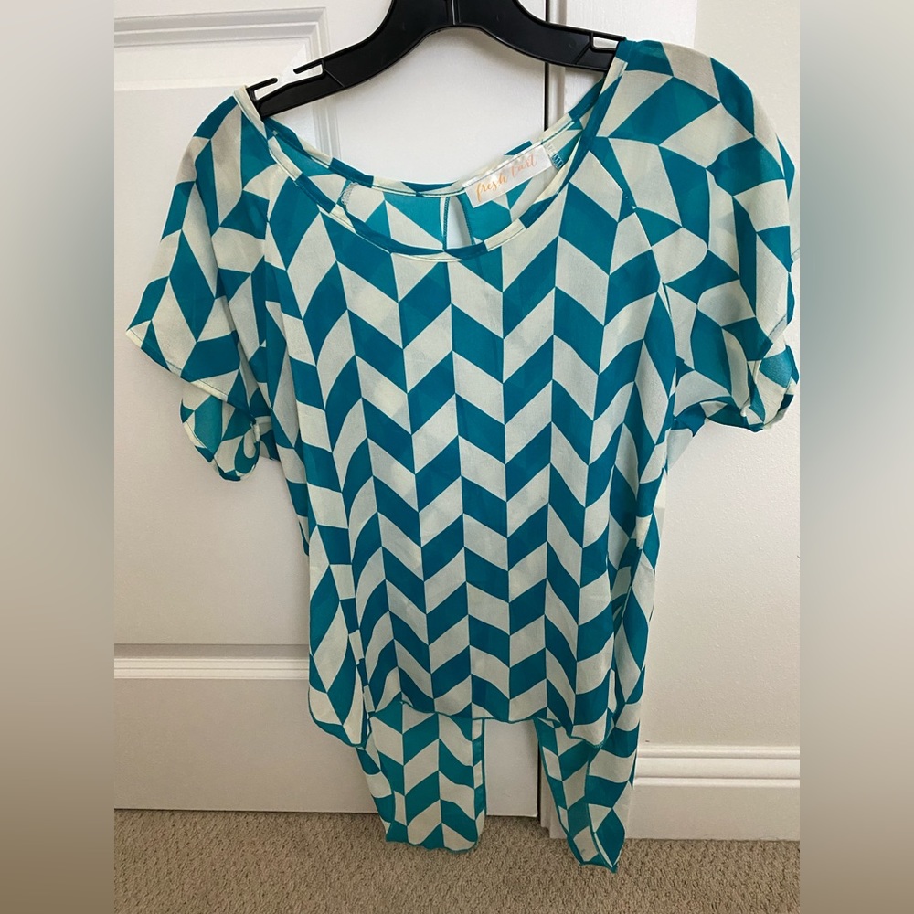 Turquoise and white blouse